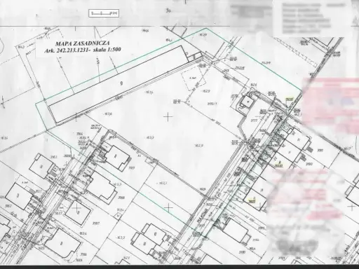 Mapa zasadnicza do warunków zabudowy z zaznaczonymi działkami, budynkami i infrastrukturą. Skala 1:500.