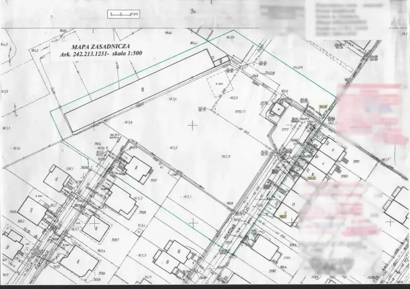 Mapa zasadnicza do warunków zabudowy z zaznaczonymi działkami, budynkami i infrastrukturą. Skala 1:500.